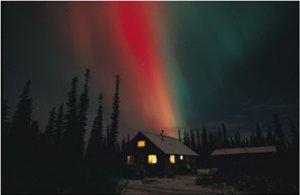 The aurora borealis colors the sky over the Quinton residence